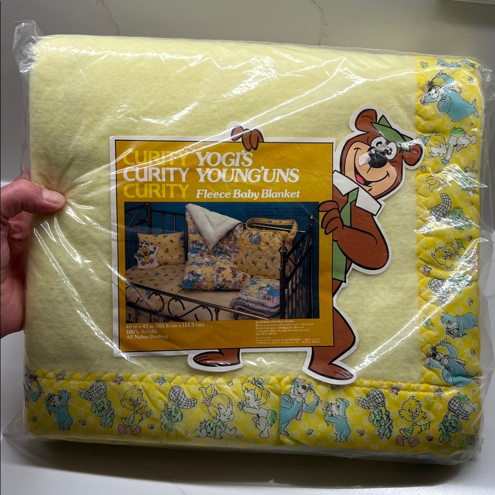 New in original packaging. Curity Yogi's Fleece Baby Blanket - Yellow Yogi Bear